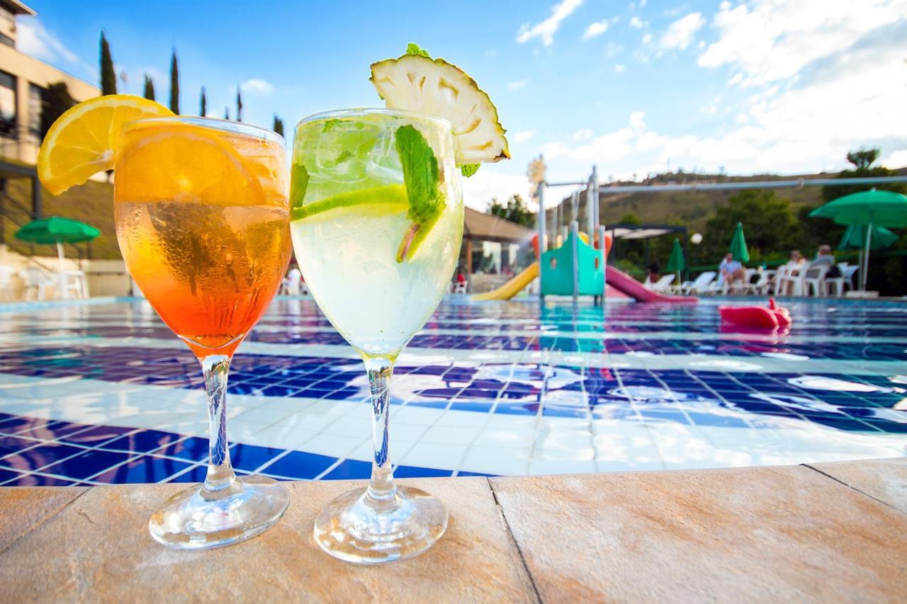 Hotel Golden Park All Inclusive Pocos De Caldas By Nacional Inn מראה חיצוני תמונה Two Aperol Spritz cocktails